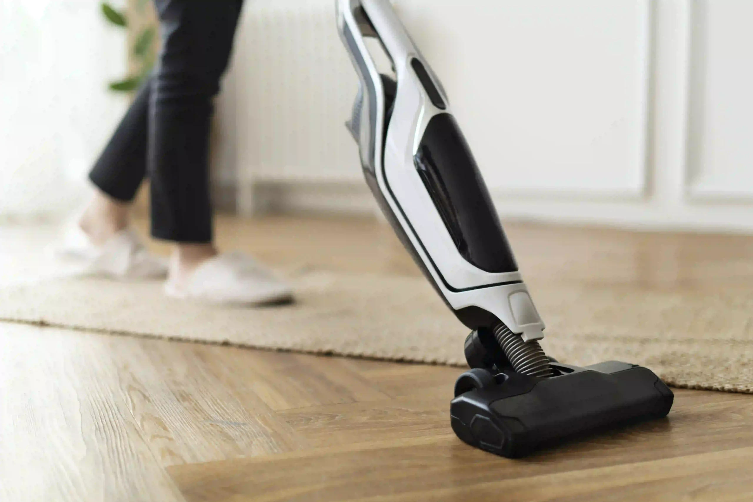 image of cleaning house with essential cleaning tool vacuum cleaner
